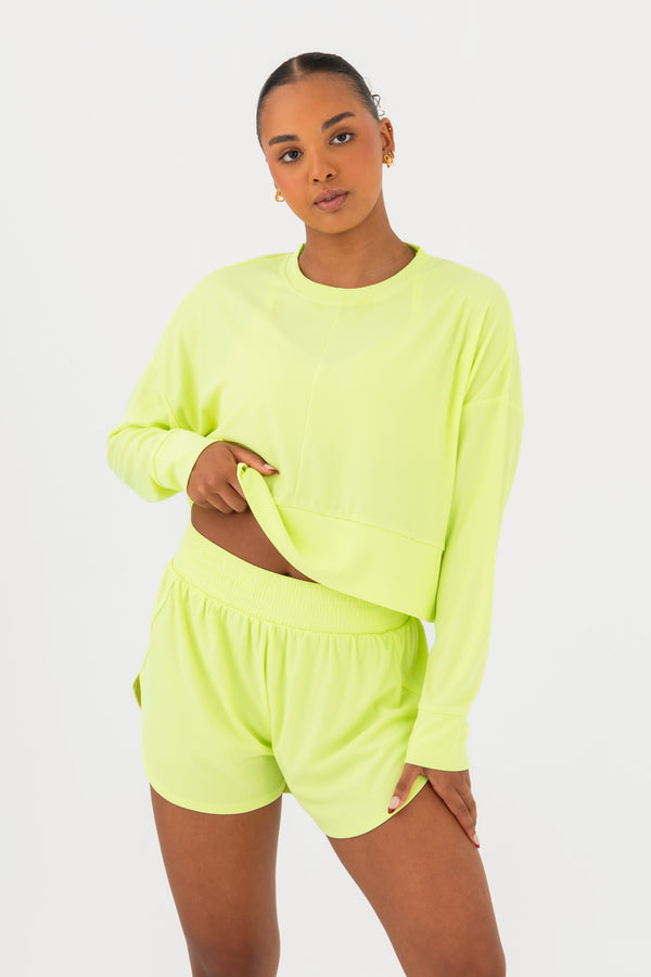 Every Turn Disco Pullover Sweater  In Yellow Zing, Oversized, Cropped Fit, Front View.