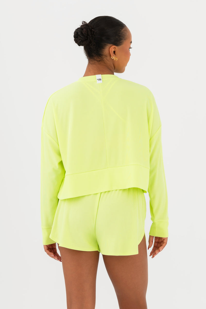 Every Turn Disco Pullover Sweater  In Yellow Zing, Oversized, Cropped Fit, Back View.