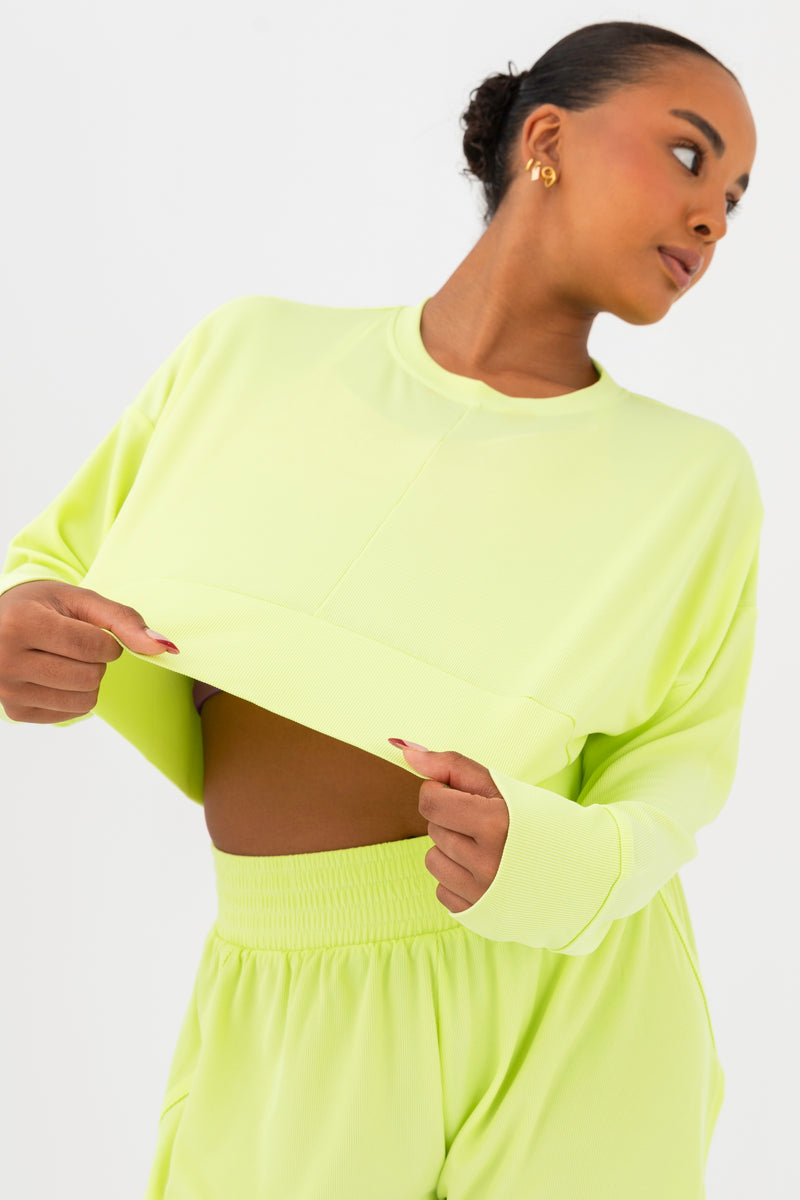 Every Turn Disco Pullover Sweater  In Yellow Zing, Oversized, Cropped Fit, Front Up Close View.