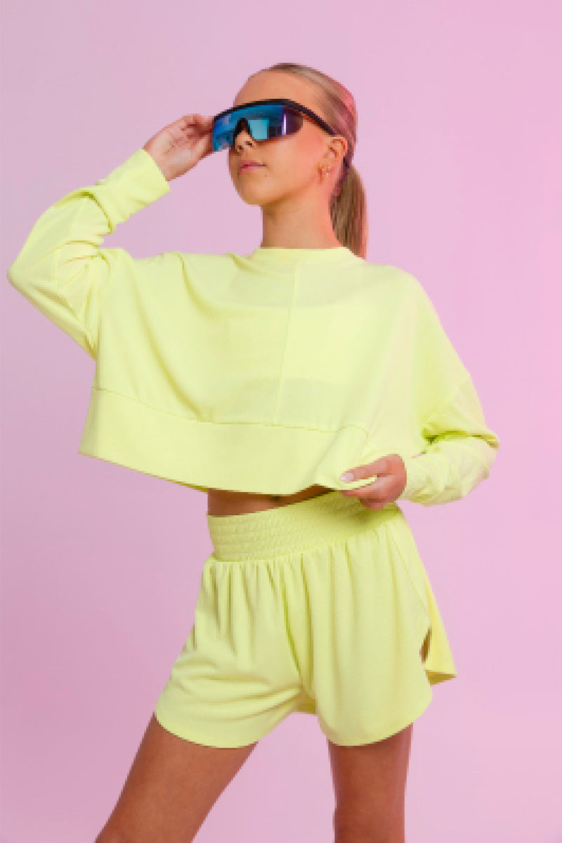 Every Turn Disco Pullover Sweater  In Yellow Zing, Oversized, Cropped Fit, Front Up Close View.