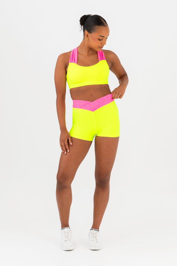 Every Turn Hawaii Short  In Yellow Zing, Crossover V-Waistband, Front View.