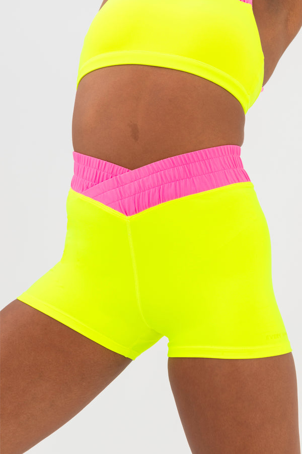 Every Turn Hawaii Short  In Yellow Zing, Crossover V-Waistband, Close Up.