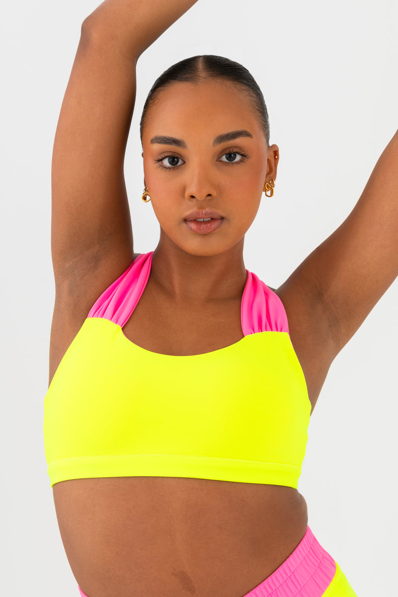Every Turn Ibiza Reversible Crop Top  In Yellow Zing, Crossover V-Waistband, Close Up.